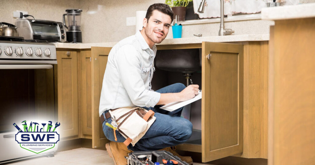 Plumbing Maintenance Plumber Checking Sink